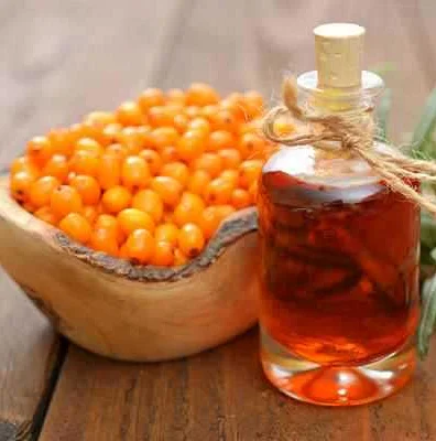 Different Uses of Candles with Sea Buckthorn